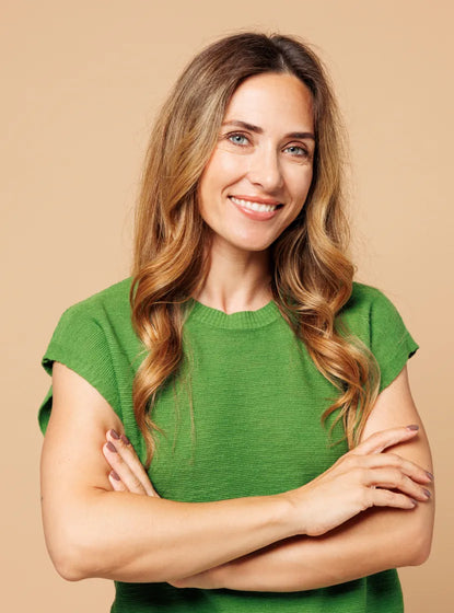 Fit middle aged woman smiling at camera