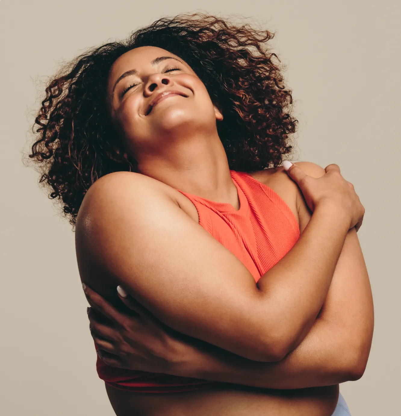 Woman on weight loss journey  embracing herself